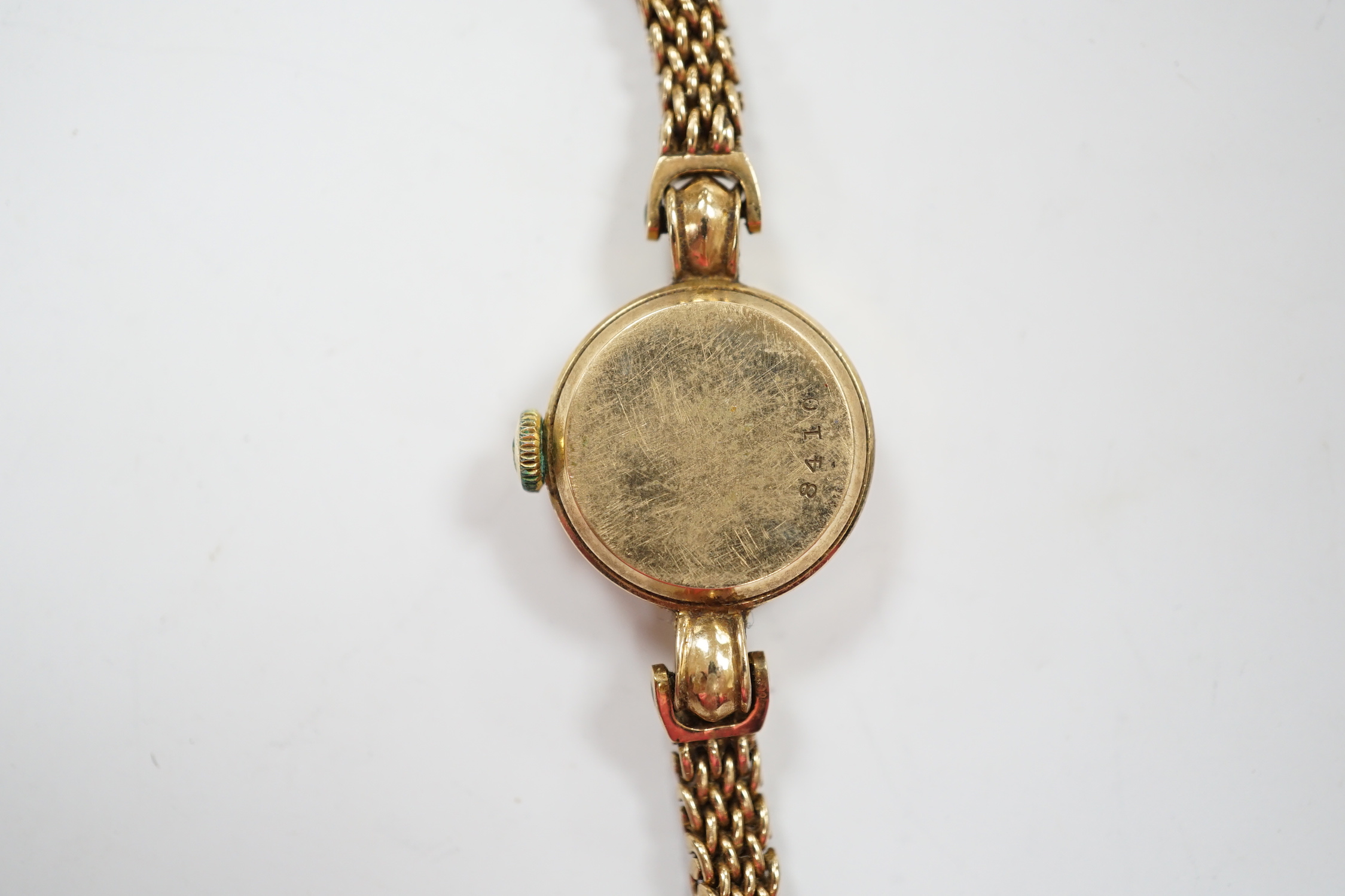 A lady's 9ct gold Jaeger LeCoultre manual wind wrist watch, on an associated 9ct gold bracelet, overall 16.8cm, gross weight 20.4 grams.